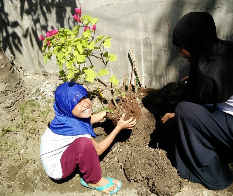 Planting Flower With Our  Orphan Girls