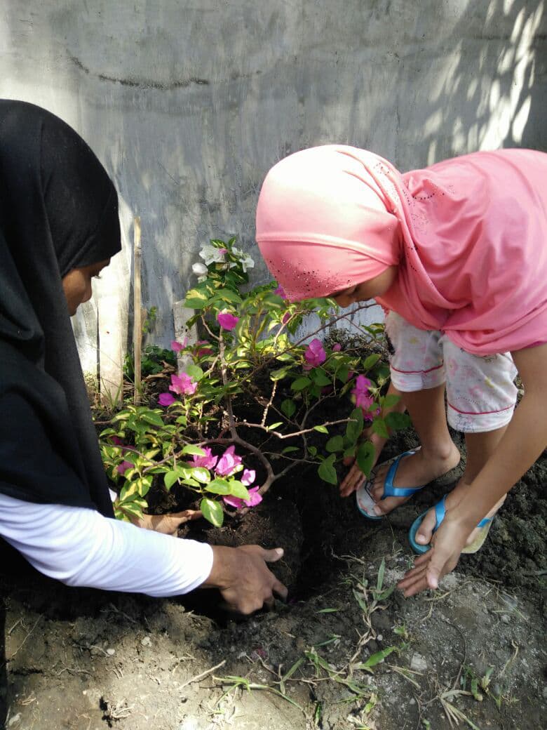 Planting Flower With Our  Orphan Girls