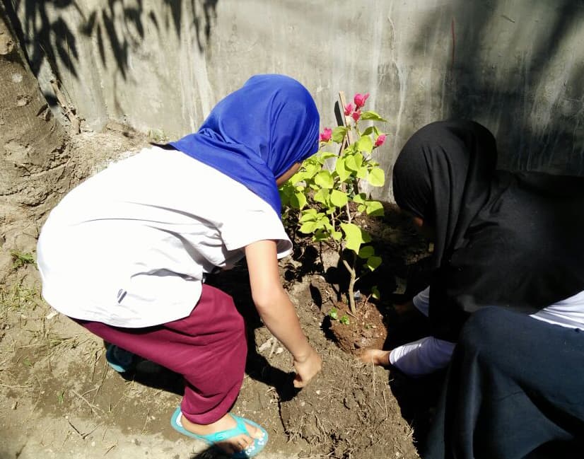 Planting Flower With Our  Orphan Girls